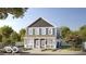 Charming blue two-story home featuring a covered front porch and classic architectural design at 2833 Macpherson Ave, Indianapolis, IN 46205