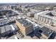 Extensive aerial view capturing a diverse urban landscape filled with buildings and parking at 30 W Main St # 3D, Carmel, IN 46032