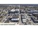 Overhead view of a vibrant town center featuring diverse buildings, street parking, and bustling thoroughfares at 30 W Main St # 3D, Carmel, IN 46032