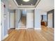 Open living space with staircase, kitchen and hardwood floors at 30 W Main St # 3D, Carmel, IN 46032