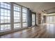 Living room features a gas fireplace, hardwood floors, recessed lighting and neighborhood views at 30 W Main St # 3D, Carmel, IN 46032