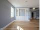 Spacious open room with built-in shelves, recessed lighting and hardwood floors at 30 W Main St # 3D, Carmel, IN 46032
