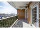 Outdoor brick patio with overhead ceiling fan and neighborhood views at 30 W Main St # 3D, Carmel, IN 46032