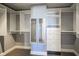 Walk-in closet with custom white shelving and drawers, providing ample storage and organization at 30 W Main St # 3D, Carmel, IN 46032