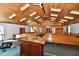 Interior shot showcasing the elevated platform, podium, and wooden pews at 302 S Sherman Dr, Indianapolis, IN 46201