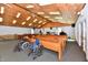 Bright church interior with wooden pews, well-lit ceiling, and handicap accessibility with two wheelchairs at 302 S Sherman Dr, Indianapolis, IN 46201