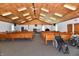 Light-filled church interior featuring wooden pews, peaked ceilings, and handicap accessibility wheelchairs at 302 S Sherman Dr, Indianapolis, IN 46201