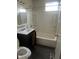Bathroom featuring vanity, toilet, and combined shower/tub unit at 3531 Welch Dr, Indianapolis, IN 46224