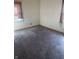 Bedroom with carpet, natural light from two windows, and neutral wall color, ready for personalization at 3531 Welch Dr, Indianapolis, IN 46224