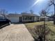 Charming single-story home with attached garage and well-maintained front yard at 3531 Welch Dr, Indianapolis, IN 46224