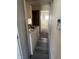 Hallway with laundry area including a washer and dryer, and views into the adjacent room at 3531 Welch Dr, Indianapolis, IN 46224