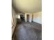 Large living room with an opening to the kitchen; carpeted for comfort and easy living at 3531 Welch Dr, Indianapolis, IN 46224