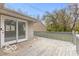 Wooden deck with sliding glass doors leading inside and views of the backyard at 3550 N Edmondson Ave, Indianapolis, IN 46226