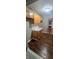 Kitchen showcases wooden cabinets, marble countertops, and dark brown flooring at 3550 N Edmondson Ave, Indianapolis, IN 46226