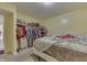 Bedroom showcasing an open closet and a queen-sized bed at 3652 Yellow Poplar Ct, Indianapolis, IN 46222