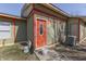 Home with a red front door, green and red trim, and an exterior AC unit at 3652 Yellow Poplar Ct, Indianapolis, IN 46222