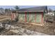 The back view of a home shows the exterior, trim, and roof at 3652 Yellow Poplar Ct, Indianapolis, IN 46222