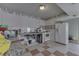 Functional kitchen featuring white appliances, tiled floor, and marble counters at 3652 Yellow Poplar Ct, Indianapolis, IN 46222
