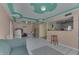 Spacious living room with tiled floors and partial view of the kitchen at 3652 Yellow Poplar Ct, Indianapolis, IN 46222