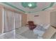 A well-lit living room featuring tiled floors and a comfortable recliner at 3652 Yellow Poplar Ct, Indianapolis, IN 46222