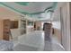 Open concept living room showing tiled floors, the kitchen, and stylish ceiling accents at 3652 Yellow Poplar Ct, Indianapolis, IN 46222