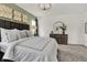 Beautiful main bedroom suite with king bed, elegant décor, and a view of outdoor scenery at 3769 Cantebury Dr, Franklin, IN 46131