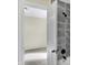 Bathroom featuring gray tile and a shower at 39 S Holmes Ave, Indianapolis, IN 46222