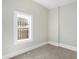 Bedroom featuring carpet and a window that provides natural light at 39 S Holmes Ave, Indianapolis, IN 46222