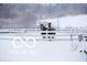 Snowy landscape featuring two horses standing near a white fence in a winter setting at 4031 N Banta Rd, Bargersville, IN 46106