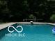 Refreshing in-ground pool features a diving board and inviting blue water at 4031 N Banta Rd, Bargersville, IN 46106