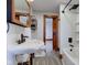 Bathroom with vintage sink, toilet, shower and dark wood trim at 4254 N 200 W, Greenfield, IN 46140