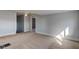 Spacious bedroom features neutral carpet, fresh paint, and an open doorway at 4254 N 200 W, Greenfield, IN 46140