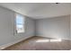 Neutral bedroom featuring a window letting in natural light at 4254 N 200 W, Greenfield, IN 46140