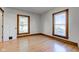 Bright bedroom with wood trim and two windows at 4254 N 200 W, Greenfield, IN 46140