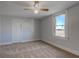 Bedroom with a ceiling fan and window at 4254 N 200 W, Greenfield, IN 46140