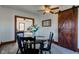 Cozy dining room with wood accents, a sliding barn door, and a view into the living room at 4254 N 200 W, Greenfield, IN 46140