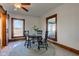 Eat-in kitchen with natural light, stylish ceiling fan, and sliding barn door at 4254 N 200 W, Greenfield, IN 46140