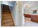 Hallway with staircase and view to the kitchen at 4254 N 200 W, Greenfield, IN 46140
