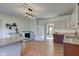 Open concept kitchen with stainless appliances and gas range, plus a washer and dryer at 4254 N 200 W, Greenfield, IN 46140