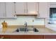 Stainless steel kitchen sink with view of granite counters at 4254 N 200 W, Greenfield, IN 46140