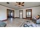 Bright and airy living room with new floors, wood trim, and updated lighting at 4254 N 200 W, Greenfield, IN 46140