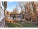 Backyard deck features wood flooring, black railing, and view of the yard and wooded area at 4313 W Hidden Preserve Cv, New Palestine, IN 46163