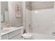 Clean bathroom featuring a tub, shower, a white vanity with a sink, and modern fixtures at 4313 W Hidden Preserve Cv, New Palestine, IN 46163