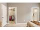 Bedroom with a walk-in closet containing ample shelving and rods for organization at 4313 W Hidden Preserve Cv, New Palestine, IN 46163