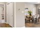 This dining area features a wood table, six upholstered chairs, and attractive modern decor at 4313 W Hidden Preserve Cv, New Palestine, IN 46163