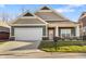 Charming single-Gathering home with a well-manicured lawn, covered porch, and attached two-car garage at 4313 W Hidden Preserve Cv, New Palestine, IN 46163