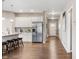 Spacious kitchen with stainless steel appliances, granite countertops, island, and modern lighting at 4313 W Hidden Preserve Cv, New Palestine, IN 46163