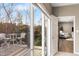 Outdoor patio with seating and view of the backyard at 4313 W Hidden Preserve Cv, New Palestine, IN 46163