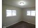 Bedroom features plush carpeting, natural light, and neutral walls for ultimate comfort at 4530 Wichser Ct, Indianapolis, IN 46228
