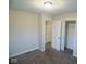 Neutral tones create a serene atmosphere in this carpeted bedroom at 4530 Wichser Ct, Indianapolis, IN 46228